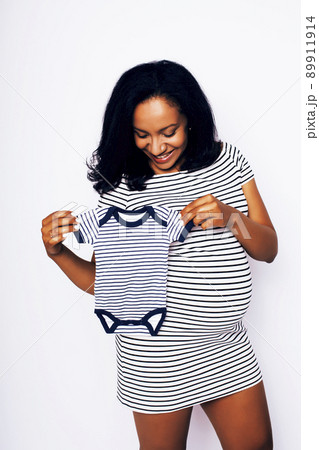 young pretty african american woman pregnant happy smiling, posing on white background isolated , lifestyle people concept copyspace close up 89911914