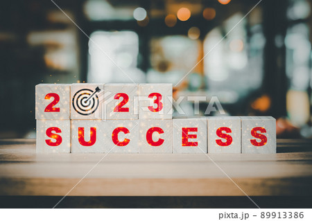 2023 numbers and words of success on wooden cube blocks with abstract bokeh interior room background 2023 numbers and words of success on wooden cube blocks with abstract bokeh interior room background 89913386