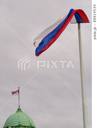 Huge flag of Serbia in front of the National Assembly of Serbia in Belgrade Huge flag of Serbia in front of the National Assembly of Serbia in Belgrade 89914534