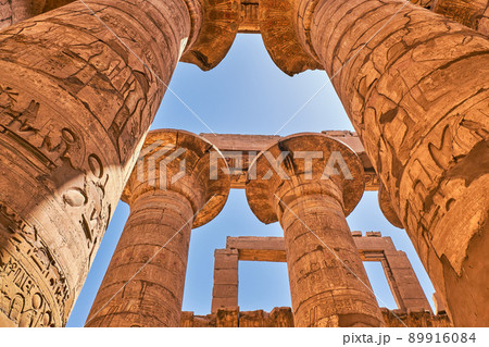 Massive pillars of the Great Hypostyle Hall in the Karnak temple in Luxor, Egypt 89916084