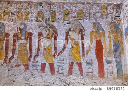 Ancient paintings and Egyptian hieroglyphs at the pharaoh tomb in the Valley of the Kings in Luxor, Egypt 89916322