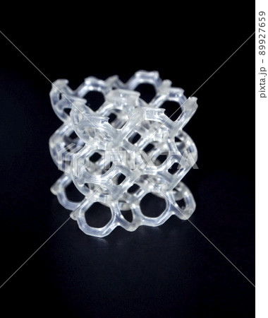 Abstract model printed on 3d printer close-up. Object photopolymer printed on stereolithography 3D printer. Technology of liquid photopolymerization under UV light. New additive 3D printing technology Abstract model printed on 3d printer close-up. Object photopolymer printed on stereolithography 3D printer. Technology of liquid photopolymerization under UV light. New additive 3D printing technology 89927659