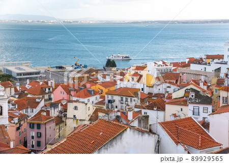Lisbon historical center skyline and the sea. Streets at summer day Lisbon historical center skyline and the sea. Streets at summer day 89929565