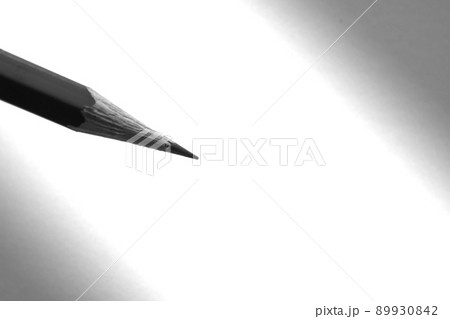 Pencil holding to write on the paper in shadow Pencil holding to write on the paper in shadow 89930842