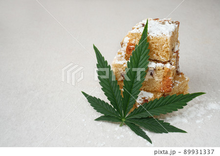 Homemade pie and powdered sugar with CBD oil. Cannabis kitchen Homemade pie and powdered sugar with CBD oil. Cannabis kitchen 89931337