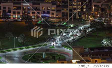 Bussy traffic on the road intersection in Dubai downtown aerial night timelapse, UAE Bussy traffic on the road intersection in Dubai downtown aerial night timelapse, UAE 89932449