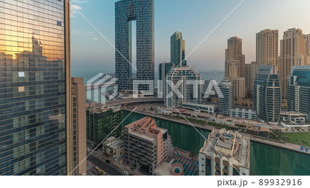 Dubai Marina skyscrapers and JBR district with luxury buildings and resorts aerial timelapse 89932916