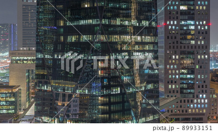 Windows of office buildings at night timelapse, the light from the windows of houses Windows of office buildings at night timelapse, the light from the windows of houses 89933151