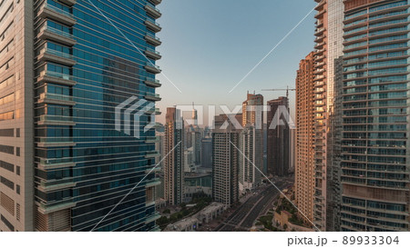 Panoramic view of the Dubai Marina and JBR area and the famous Ferris Wheel aerial morning timelapse Panoramic view of the Dubai Marina and JBR area and the famous Ferris Wheel aerial morning timelapse 89933304