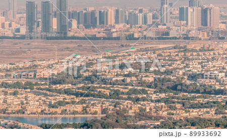 Aerial view of Jumeirah Village Circle district timelapse 89933692