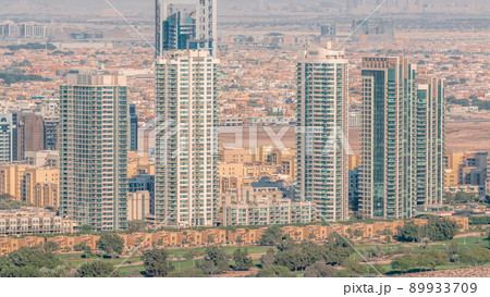 Aerial view of greens district area timelapse from Dubai marina. Aerial view of greens district area timelapse from Dubai marina. 89933709