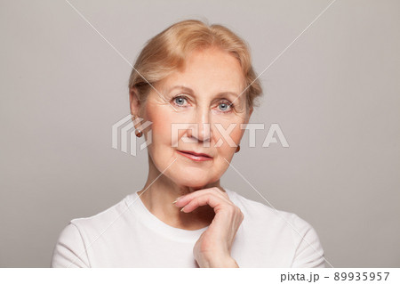 Portrait of a beautiful senior woman, female face closeup Portrait of a beautiful senior woman, female face closeup 89935957