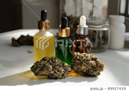 Cannabis buds with cbd oil. Marihuana extract in cosmetology. Cannabis buds with cbd oil. Marihuana extract in cosmetology. 89937439