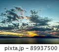 River Sunset Cloudscape Behind Hills. Golden Hour. Blue Hour. 89937500