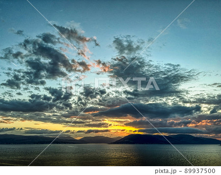 River Sunset Cloudscape Behind Hills. Golden Hour. Blue Hour. River Sunset Cloudscape Behind Hills. Golden Hour. Blue Hour. 89937500