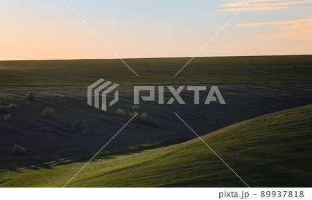 Spring hills at sunset Spring hills at sunset 89937818