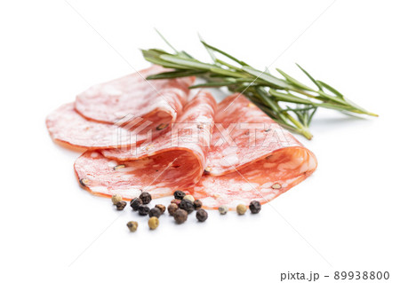 Sliced italian salami sausage with peppercorn isolated on white background. 89938800