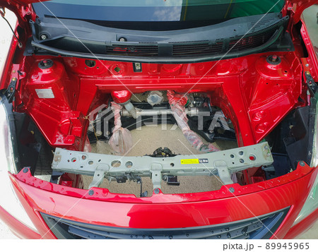 Checking car body work fiber bumper at car garage Checking car body work fiber bumper at car garage 89945965