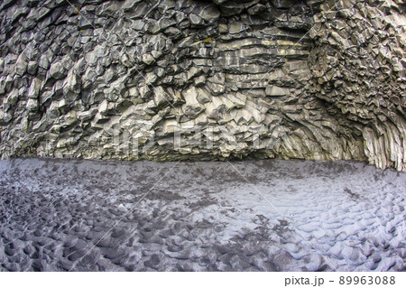 Basalt columns on a black reynisfjara beach in Iceland Basalt columns on a black reynisfjara beach in Iceland 89963088