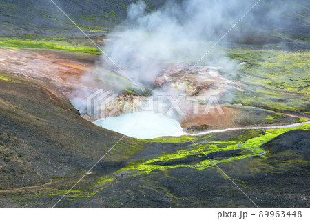 Smoking geysers in the mountains of Iceland Smoking geysers in the mountains of Iceland 89963448