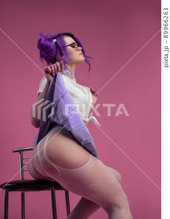 sexy schoolgirl girl with purple hair in summer short clothes and beautiful underwear on a pink background sexy schoolgirl girl with purple hair in summer short clothes and beautiful underwear on a pink background 89966263
