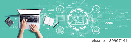 Cyber security theme with person using a laptop 89967141