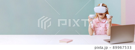A child sits in virtual reality glasses. A child sits in virtual reality glasses. 89967533