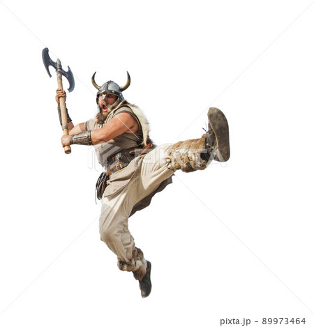 crazy strong viking with traditional costume attacking. studio shot, isolated on white background. looking at camera with angry eyes. crazy strong viking with traditional costume attacking. studio shot, isolated on white background. looking at camera with angry eyes. 89973464