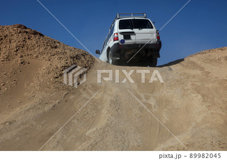 Car in desert 89982045