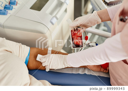 Nurse Working at Blood Donation Center Closeup 89999343