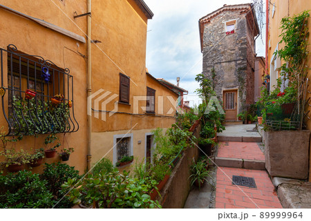 Menton. Old narrow street in the historic part of the city. 89999964