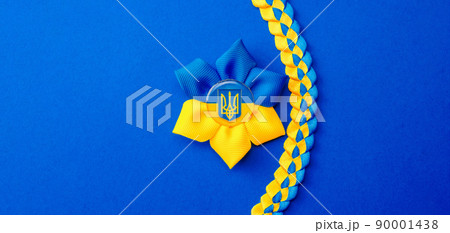 Ukraine background. Ukrainian flower trident symbol isolated on blue banner. Flat lay, copy space. 90001438