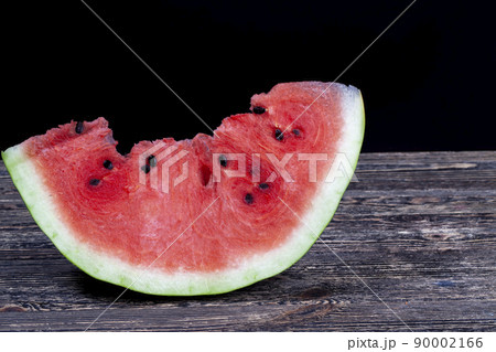 sliced red ripe watermelon during meals 90002166