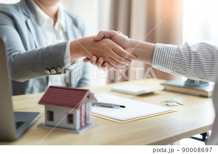 Insurance concept the chattel agent making a perfect deal of estate with his customer 90008697