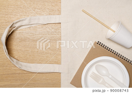 Eco friendly concept, Eco bag with food container on wooden background 90008743
