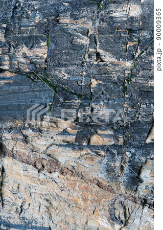 Rough structure of stone slope on surface of rock as background Rough structure of stone slope on surface of rock as background 90009365