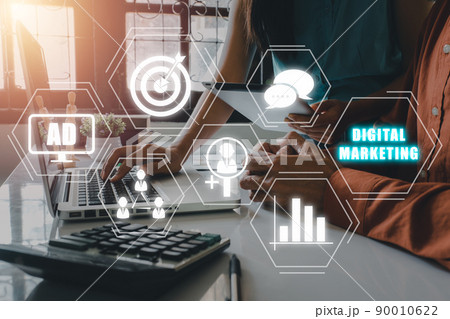 Digital marketing technology concept, Businessteam discussing data on office desk with VR screen digital marketing icon on office desk, Internet, Online, Search Engine Optimisation.. 90010622