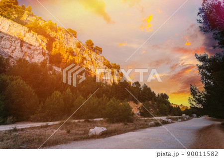 Cassis, Calanques, France. French Riviera. Beautiful Nature Of Cote De Azur On The Azure Coast Of France. Calanques. Altered sunrise Sky 90011582
