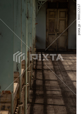 Interior of old city hall, European style building. The vintage white wooden house was left to deteriorate over time, Once be Former city hall. 90012217