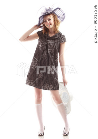 beautiful young girl in a short green dress and black stockings beautiful young girl in a short green dress and black stockings 90013596
