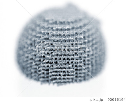 Model printed on 3D printer for metal close-up macro. Three-dimensional model printed on metal 3D printer. Model printed laser sintering machine for metal. Form printed by selective laser melting 90016164