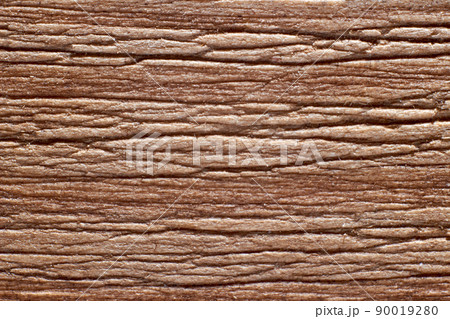 Texture of a wooden surface of beige color close-up 90019280
