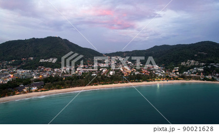 Aerial view of the island at sunset from a drone. Aerial view of the island at sunset from a drone. 90021628