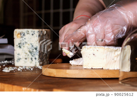 Cheese shop. Roquefort. Selective focus. Close up. Cheese shop. Roquefort. Selective focus. Close up. 90025612
