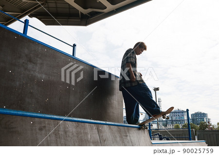 Skateboarder on Ramp 90025759