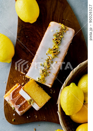 Lemon pound cake decorated with sugar icing 90026327