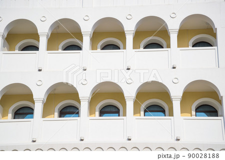 Arch facade. Arch window. Semicircular arches. Arch background. 90028188