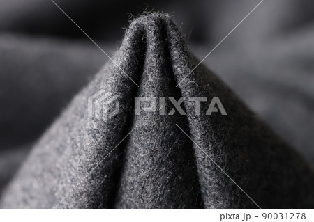 Dark gray woolen fabric in form of cone. 90031278