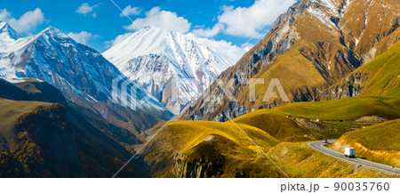 Breathtaking mountains with asphalt road Breathtaking mountains with asphalt road 90035760