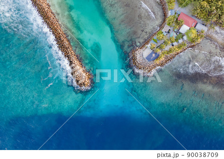 Aerial view of tropical island landscape at Fuvahmulah, Maldives Aerial view of tropical island landscape at Fuvahmulah, Maldives 90038709